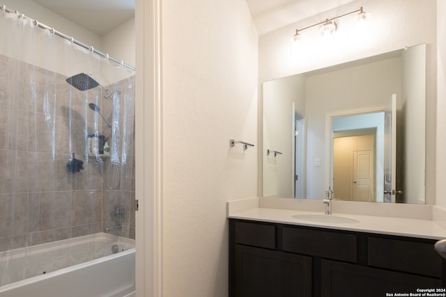 bathroom featuring shower / bath combination with curtain and vanity