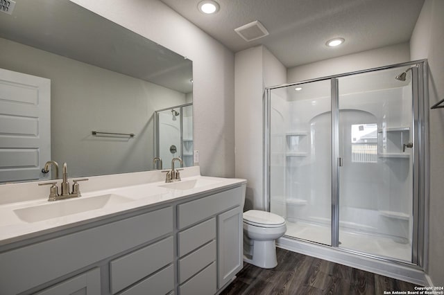 2544 Solon Ln, Seguin, TX 78155 - full bath featuring a stall shower, a sink, double vanity, and toilet