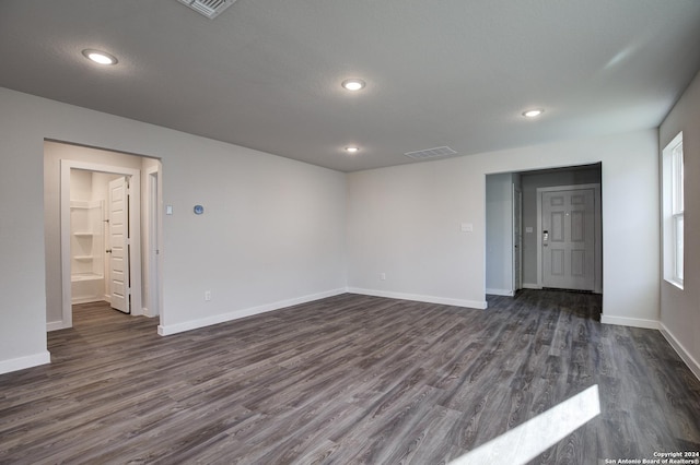 2544 Solon Ln, Seguin, TX 78155 - unfurnished room featuring baseboards, visible vents, recessed lighting, and dark wood finished floors