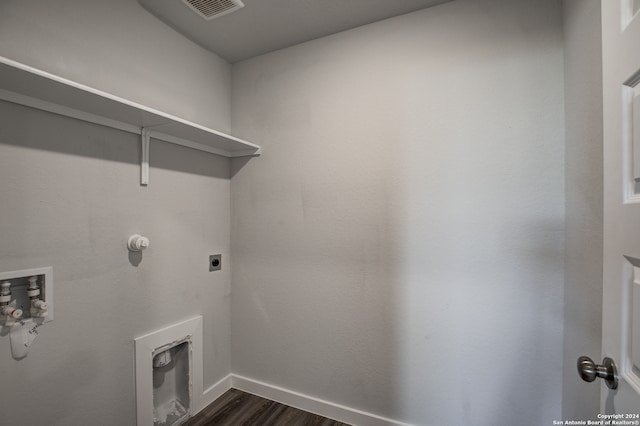 laundry room with hookup for an electric dryer, dark hardwood / wood-style floors, and hookup for a washing machine