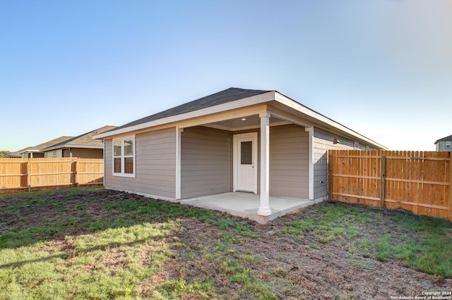 2544 Solon Ln, Seguin, TX 78155 - back of house featuring a lawn and a fenced backyard