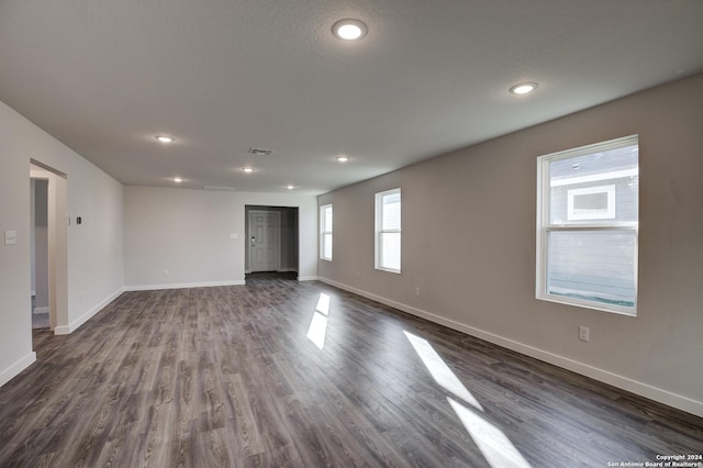 2544 Solon Ln, Seguin, TX 78155 - interior space featuring baseboards, visible vents, recessed lighting, and dark wood-type flooring