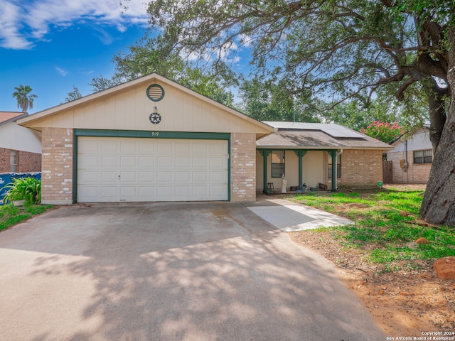 single story home featuring a garage