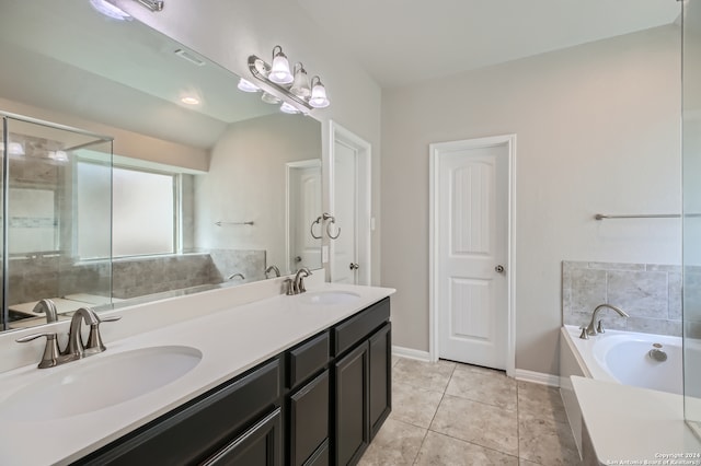 bathroom featuring lofted ceiling, vanity, plus walk in shower, and tile patterned floors