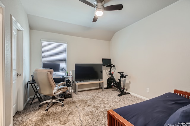 bedroom with vaulted ceiling, ceiling fan, and carpet flooring