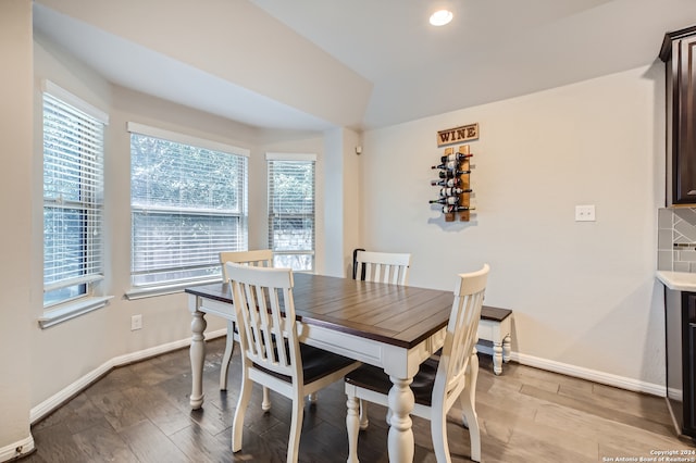 dining room with plenty of natural light and light hardwood / wood-style floors