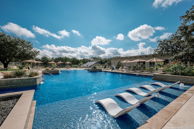 view of swimming pool featuring a patio