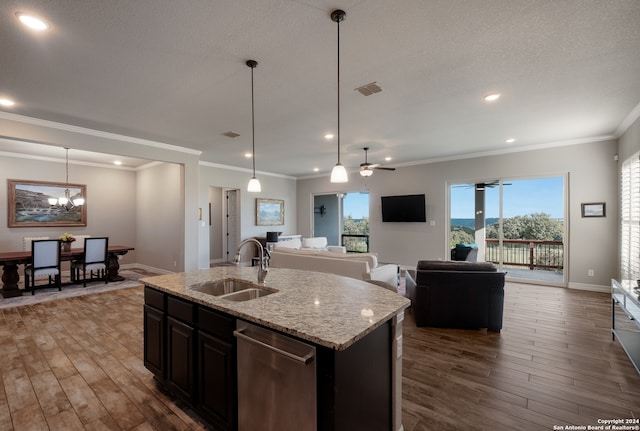 kitchen featuring sink, stainless steel dishwasher, ceiling fan with notable chandelier, hardwood / wood-style flooring, and light stone countertops