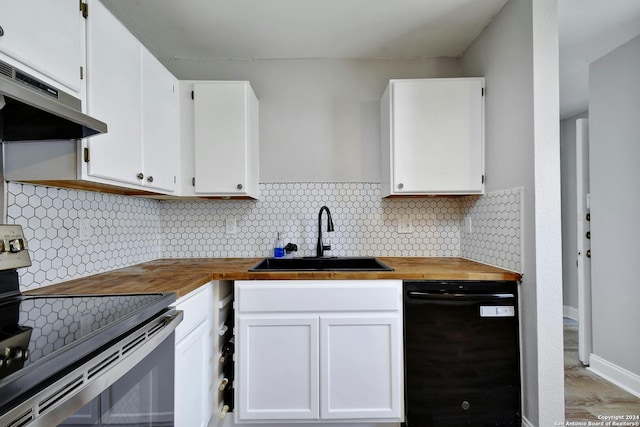 kitchen featuring decorative backsplash, white cabinetry, black dishwasher, stainless steel range with electric stovetop, and sink