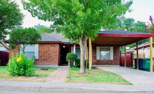 view of front facade with a carport