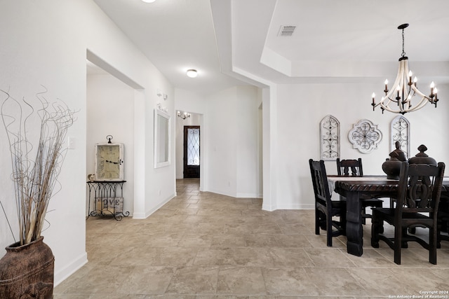 dining room featuring a chandelier