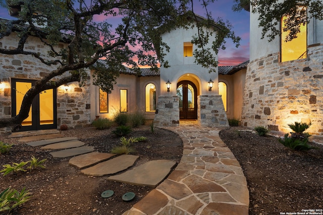 view of front facade featuring french doors