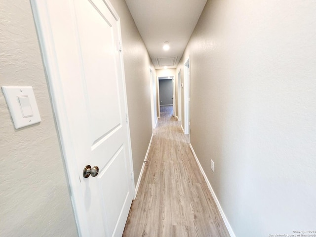 corridor featuring light wood-type flooring