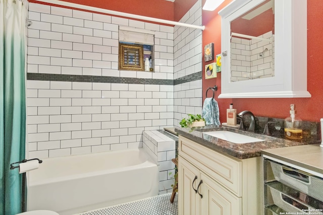 bathroom featuring vanity and shower / bath combo with shower curtain