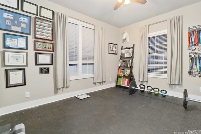 exercise area with ceiling fan