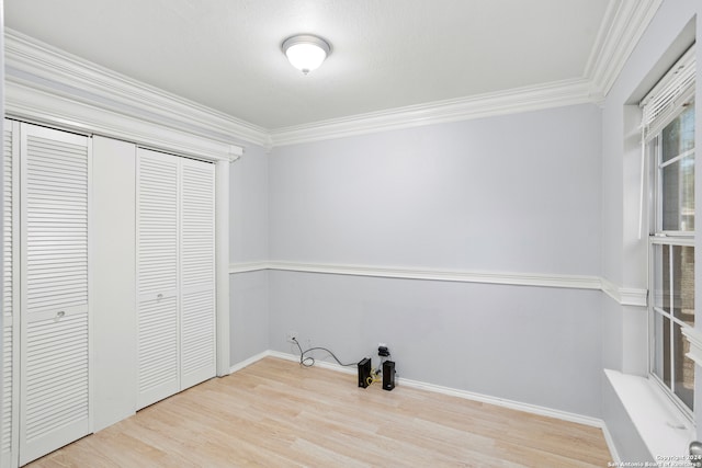 bedroom featuring crown molding and hardwood / wood-style floors