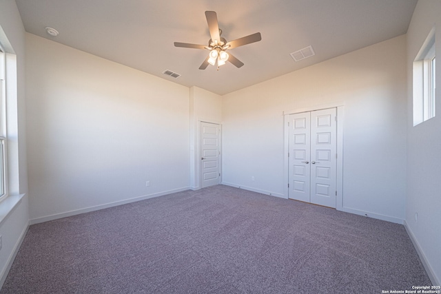 10280 Bartenheim Dr, Schertz, TX 78154 - spare room with a ceiling fan, carpet, baseboards, and lofted ceiling