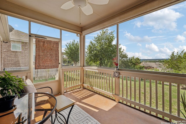 sunroom / solarium with ceiling fan and plenty of natural light