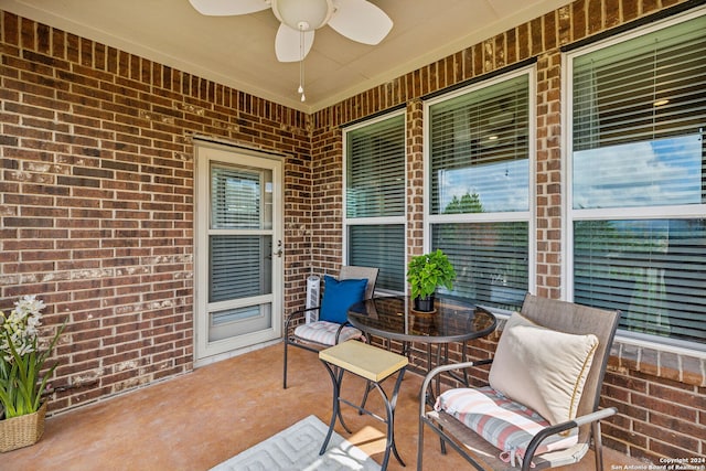 view of patio with ceiling fan