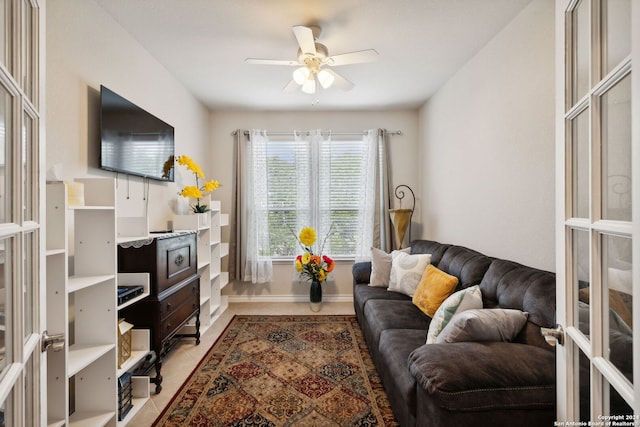 living room featuring ceiling fan