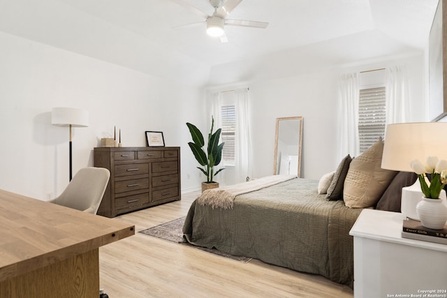 bedroom with light wood-type flooring and ceiling fan