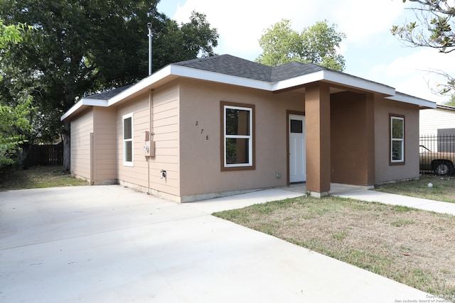 view of front facade with a patio area