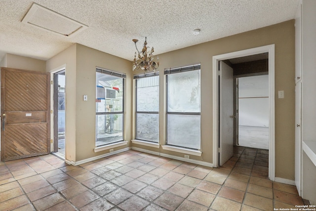 interior space with a textured ceiling