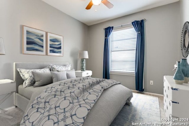 bedroom with carpet and ceiling fan