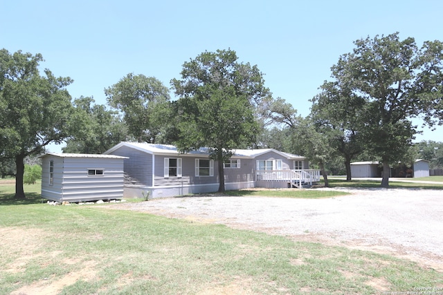 view of front of home with a front lawn