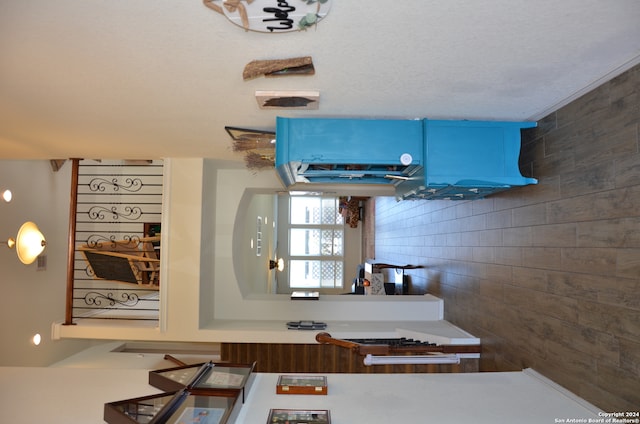 kitchen featuring tile walls