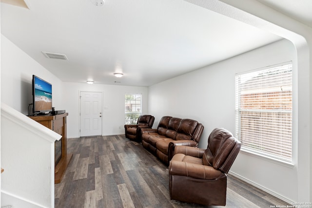 living room featuring dark hardwood / wood-style flooring