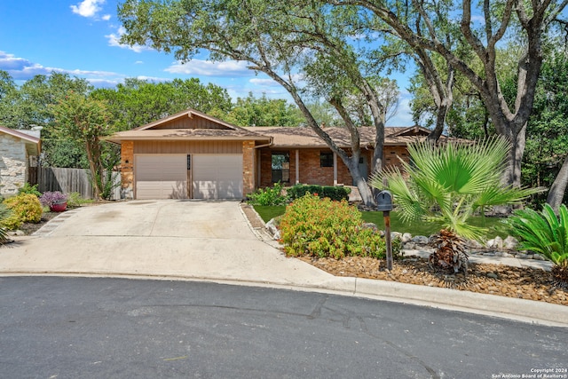 single story home with a garage