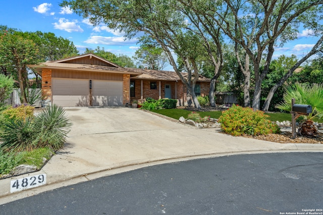 single story home with a garage