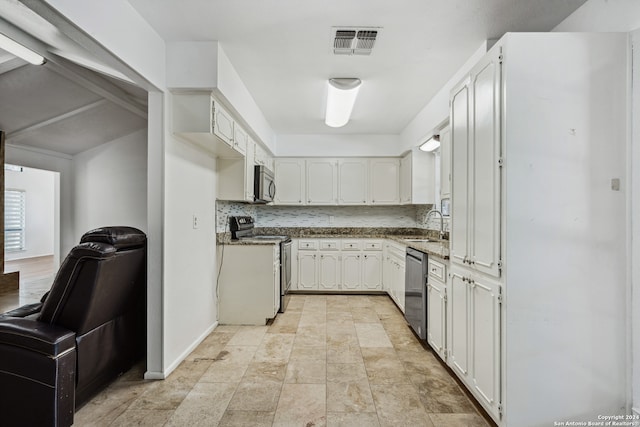 kitchen featuring decorative backsplash, stainless steel appliances, white cabinets, and sink