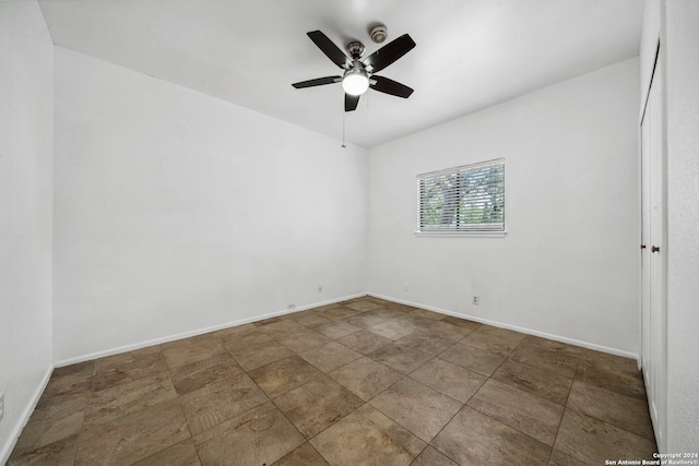 spare room with ceiling fan