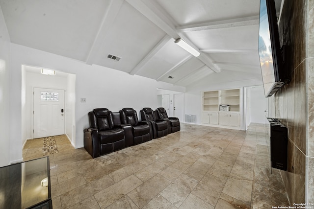 cinema featuring vaulted ceiling with beams and built in features