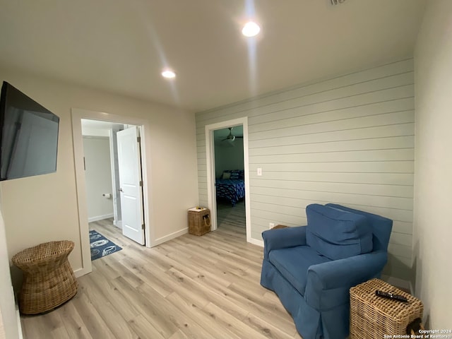 sitting room with light hardwood / wood-style floors