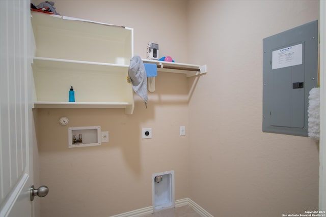 clothes washing area featuring gas dryer hookup, washer hookup, electric panel, and electric dryer hookup