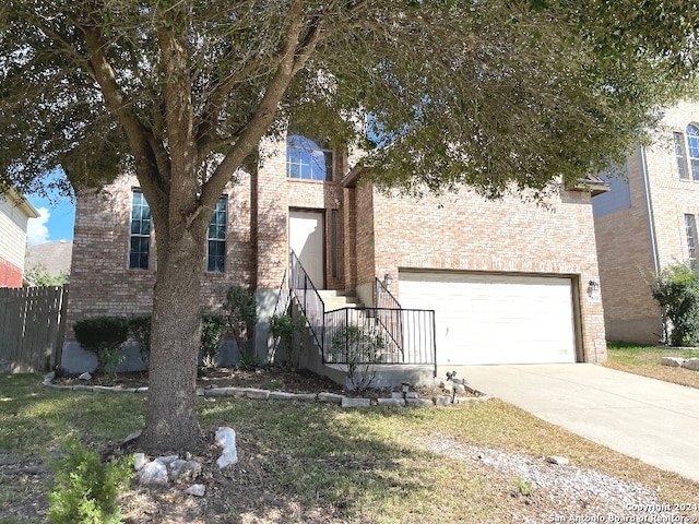 view of front of property with a garage