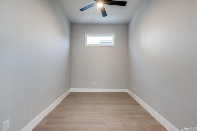 unfurnished room featuring ceiling fan and light wood-type flooring