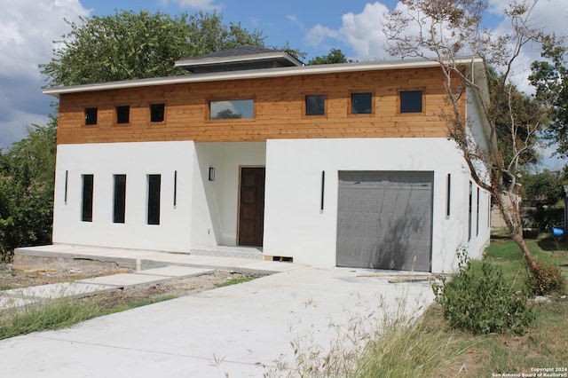 view of front of home featuring a garage