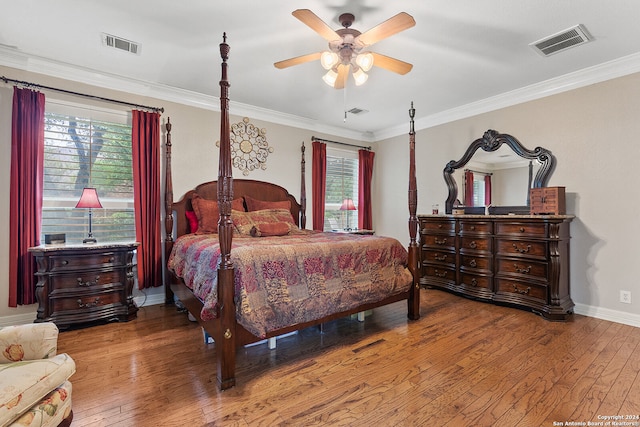 bedroom featuring ceiling fan, hardwood / wood-style flooring, and ornamental molding