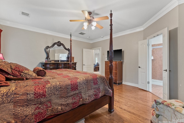 bedroom featuring ceiling fan, connected bathroom, light hardwood / wood-style flooring, and crown molding