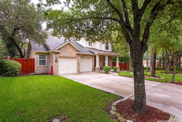 craftsman-style house with a front yard and a garage