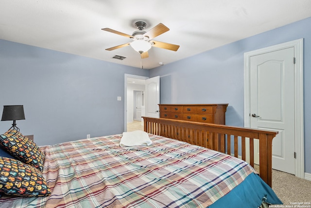 carpeted bedroom featuring ceiling fan