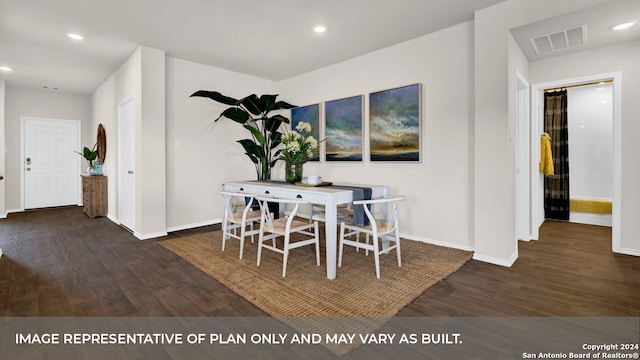 dining room featuring dark hardwood / wood-style flooring