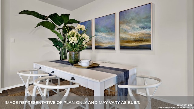 dining space featuring hardwood / wood-style floors