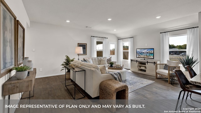 living room featuring dark hardwood / wood-style floors