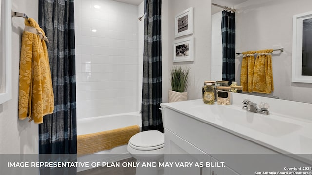 full bathroom with shower / bath combo with shower curtain, vanity, and toilet