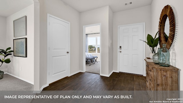 entrance foyer with dark hardwood / wood-style flooring